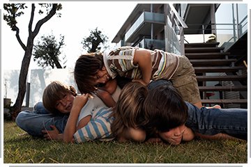 kids wrestling in the yard