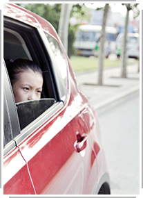 girl looking out car window