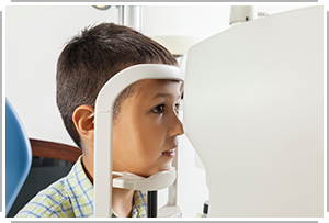 boy being tested on ophthalmoscope