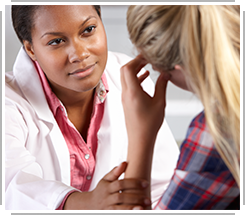 young woman with sympathetic counselor