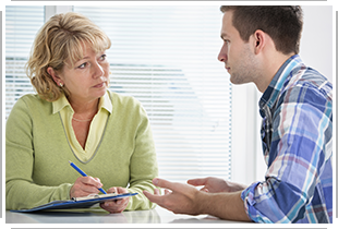 hopeful young man with counselor