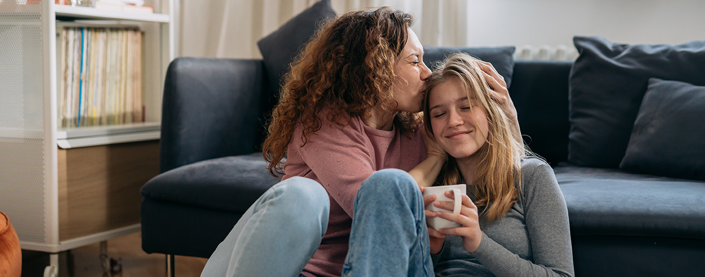 Loving mother and happy teen daughter