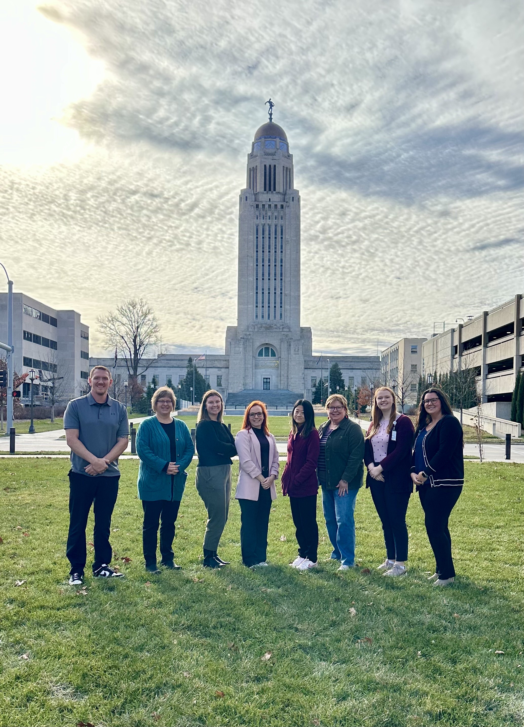 CDPCP Team stands in front of the Nebraska Capitol building.